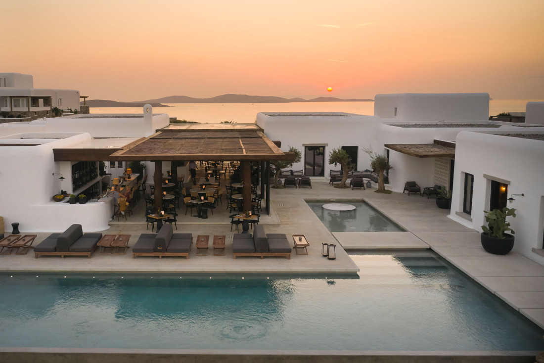 Kalesma Main Pool Bar Restaurant Sunset over Delos